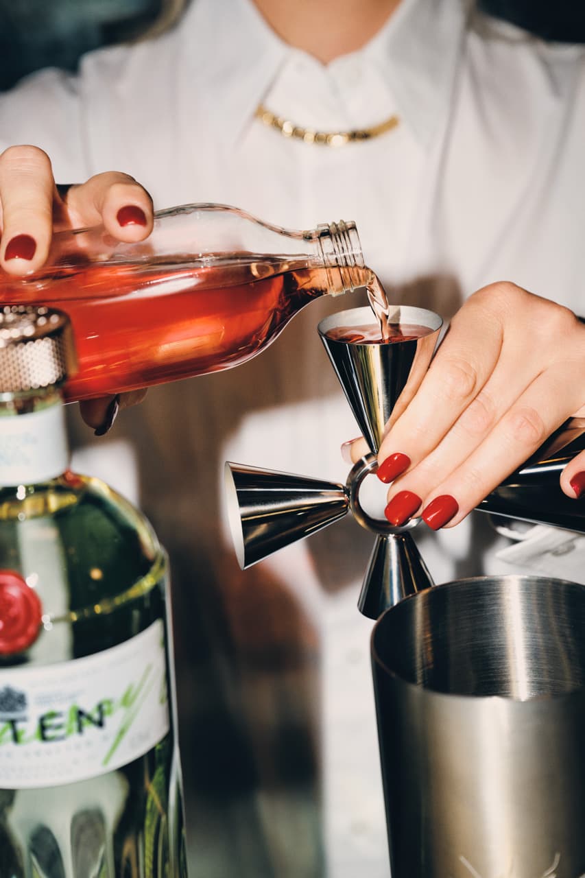 Liquid is poured into a quadri combo jigger.