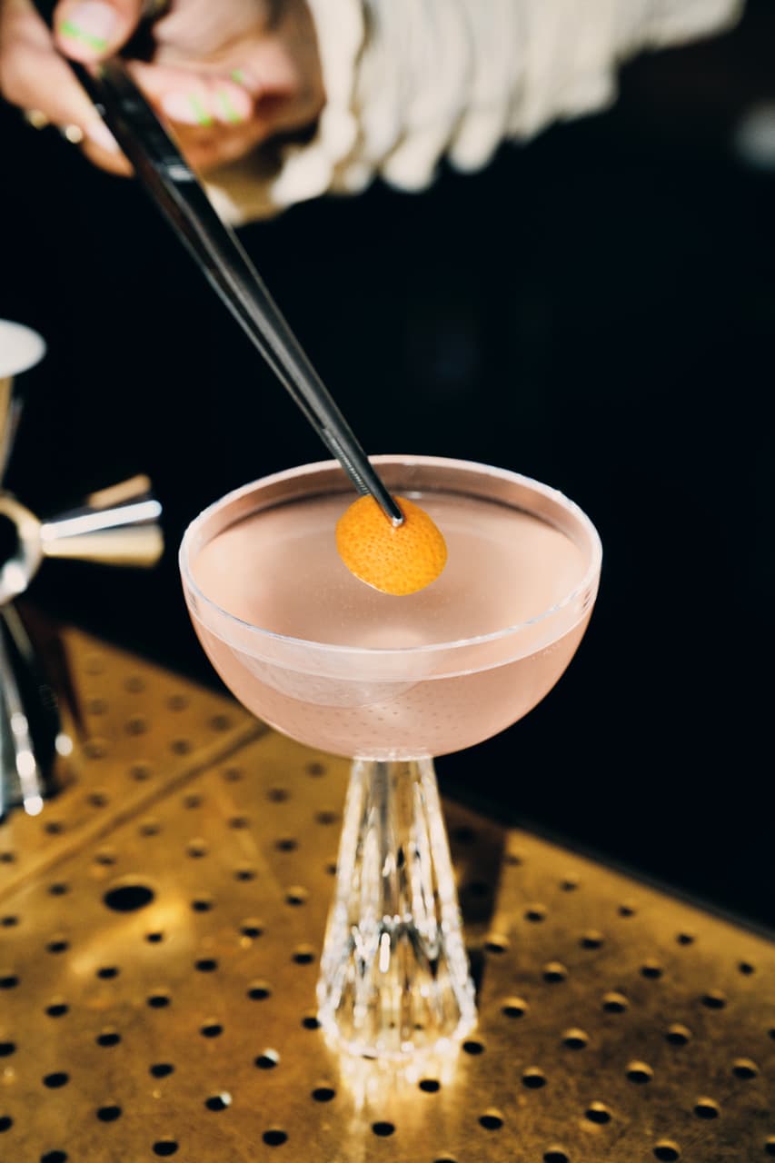 A Tiny Ten cocktail on a bar.